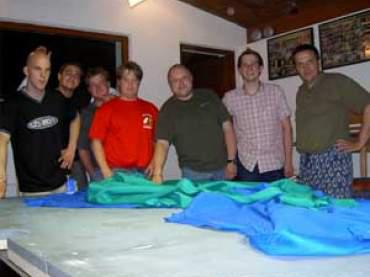 Das Tischbezieherteam